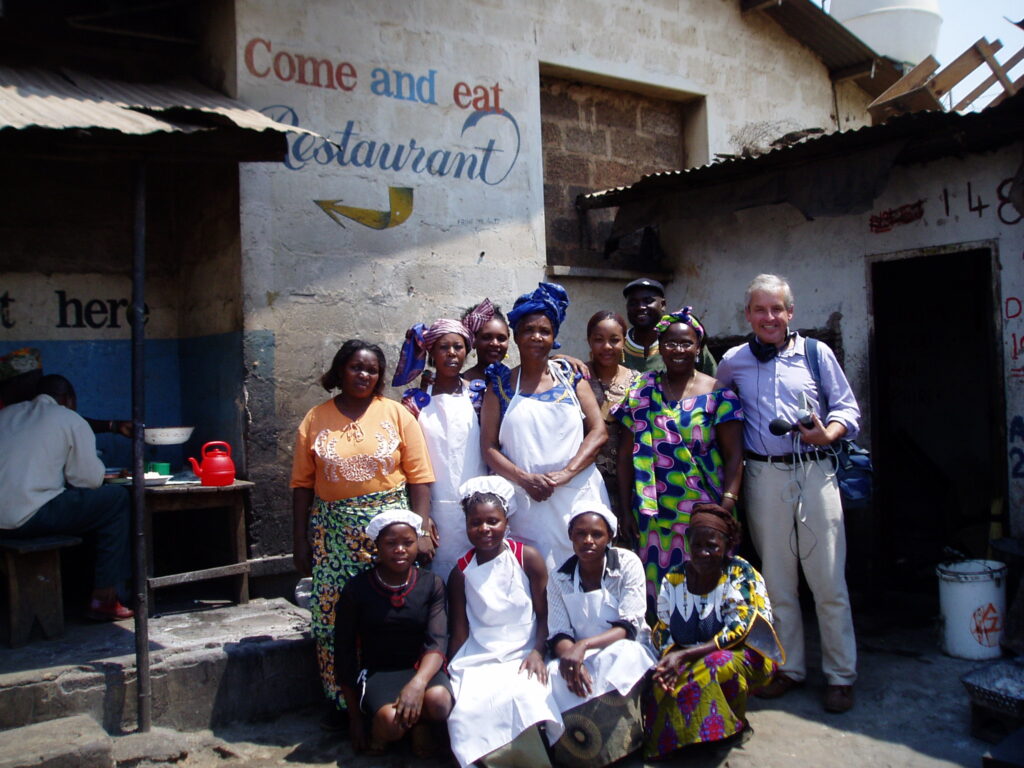 Jennifer Yuyi and radio team outside her restaurant